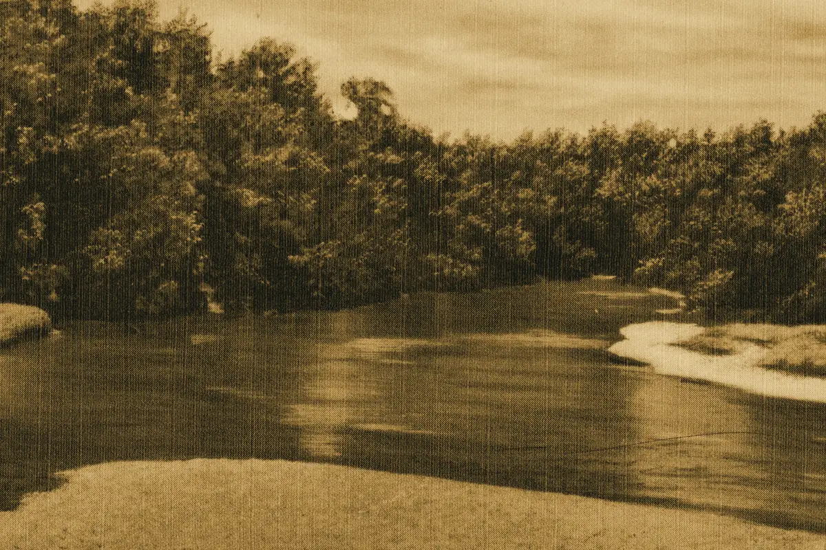 An old linen postcard of the Jacks Fork meeting the Current River near Eminence, Missouri